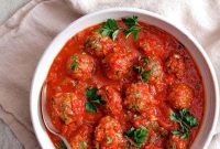 Middle Eastern Meatballs Simmered in Spiced Tomato Sauce
