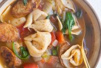 Hearty Sausage and Tortellini Soup with Rustic Herbs