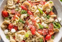 Creamy Italian Tortellini Salad with Sun-Dried Tomatoes & Pesto