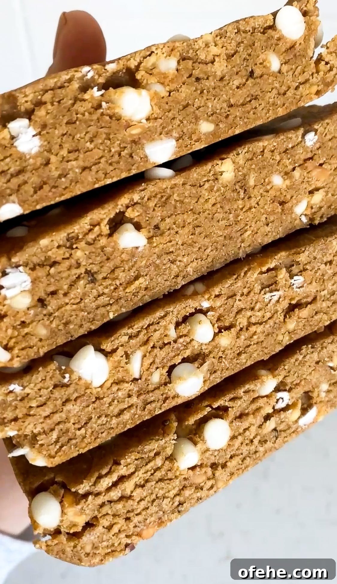 Copycat Pumpkin Protein Bars Recipe 4 close up shot of pumpkin spice protein bars stacked on top of eachother