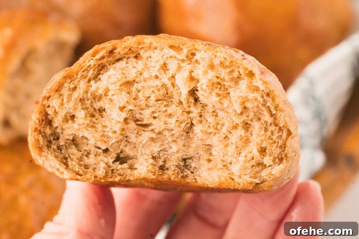 Whole Wheat Dinner Rolls Made in a Bread Machine 8 soft inside of one wheat roll.