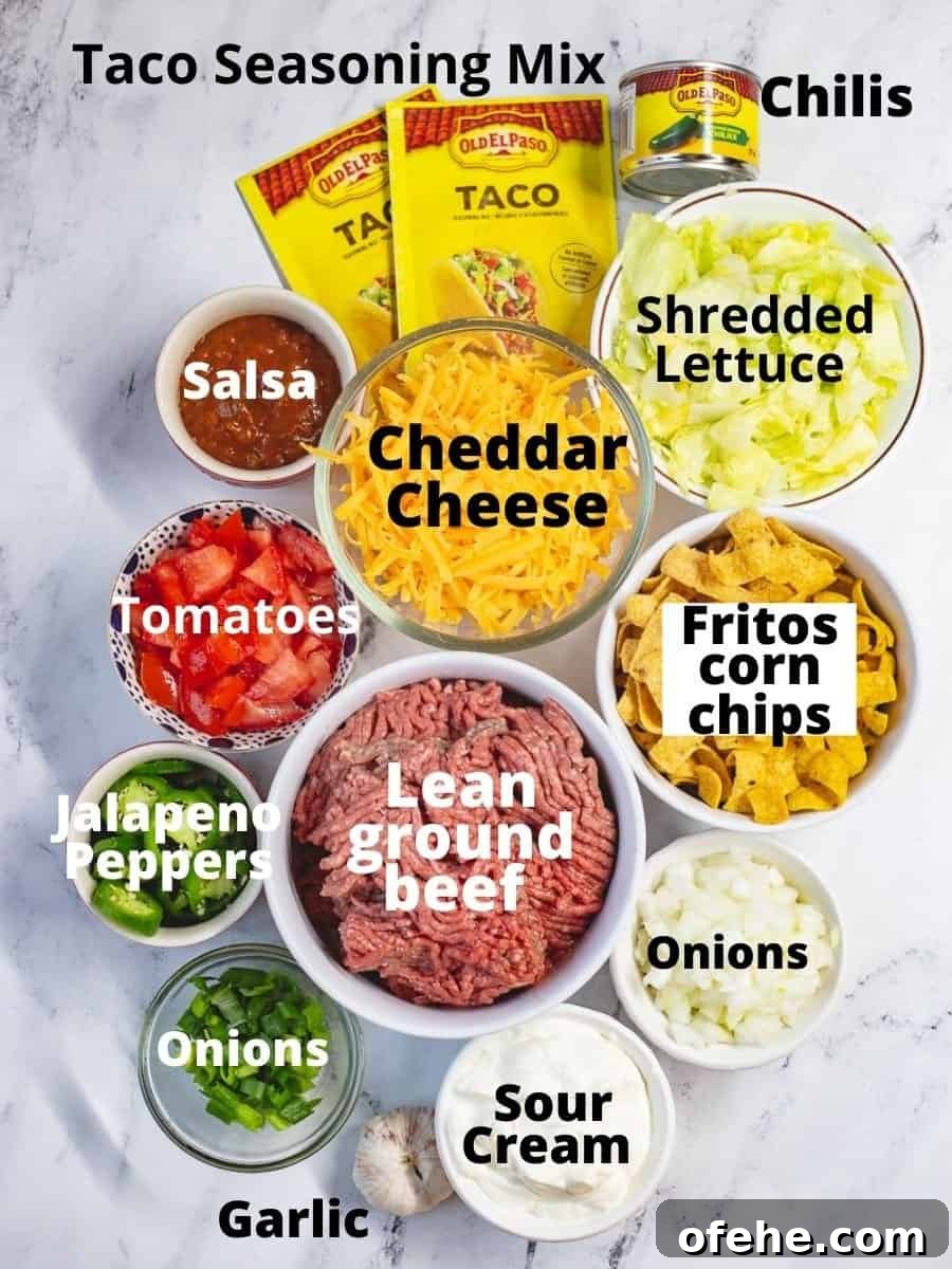 Crunchy Frito Taco Casserole with Melted Cheese and Beef 3 Ingredients for walking taco casserole in glass bowls with text overlay.