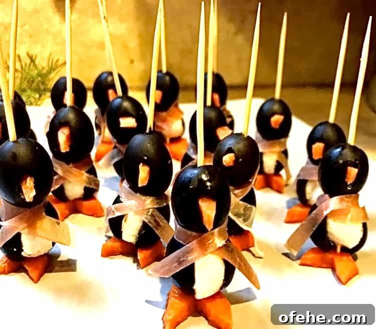 5 Crowd-Pleasing Christmas Appetizers (Plus 4 Festive Desserts) 7 Olive penguins.