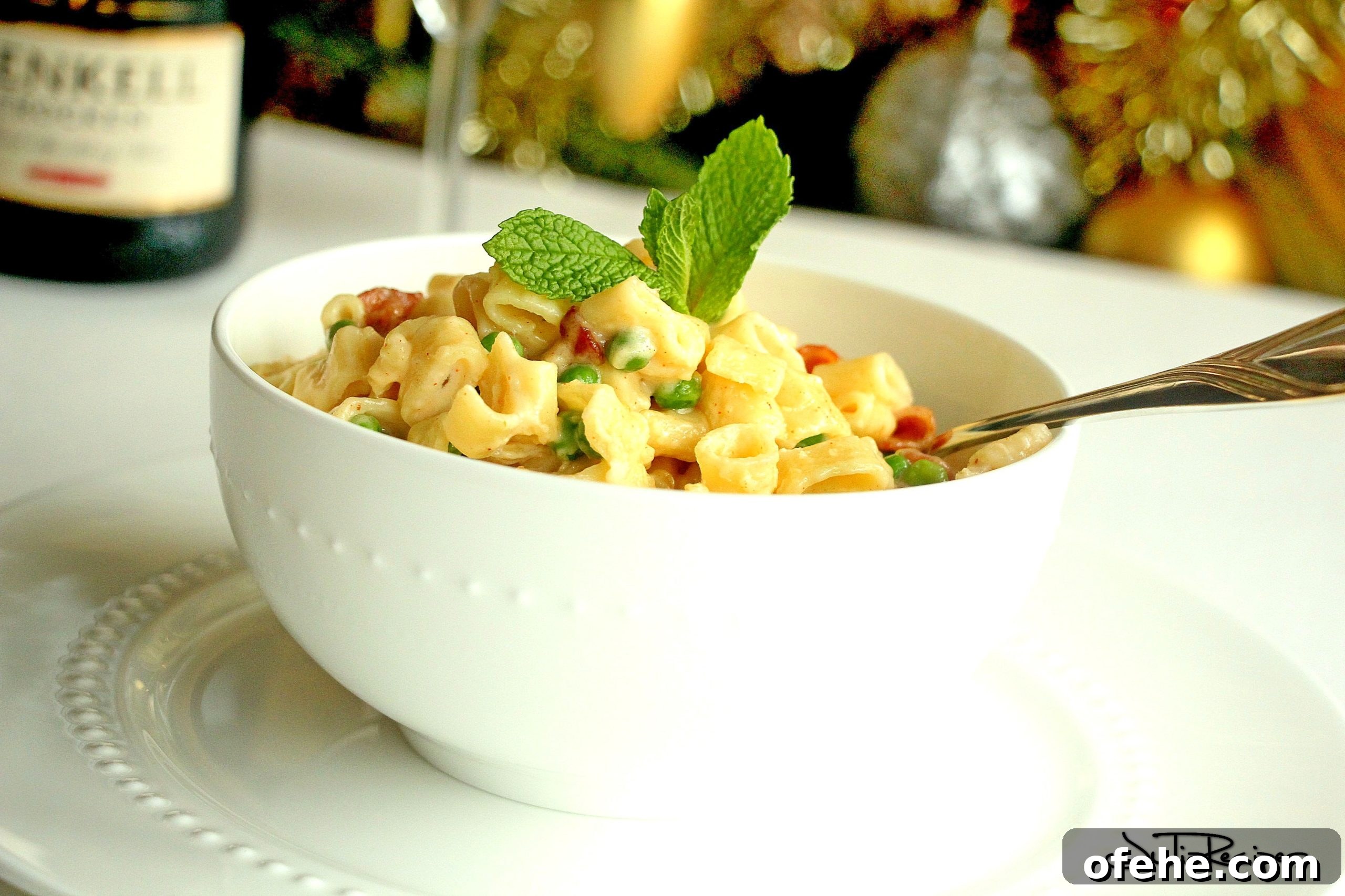 mac and cheese with bacon in white bowl