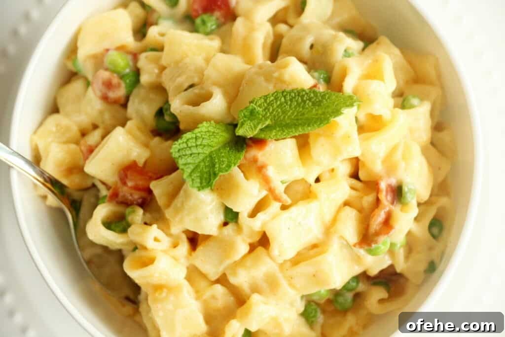 macaroni and cheese in white bowl