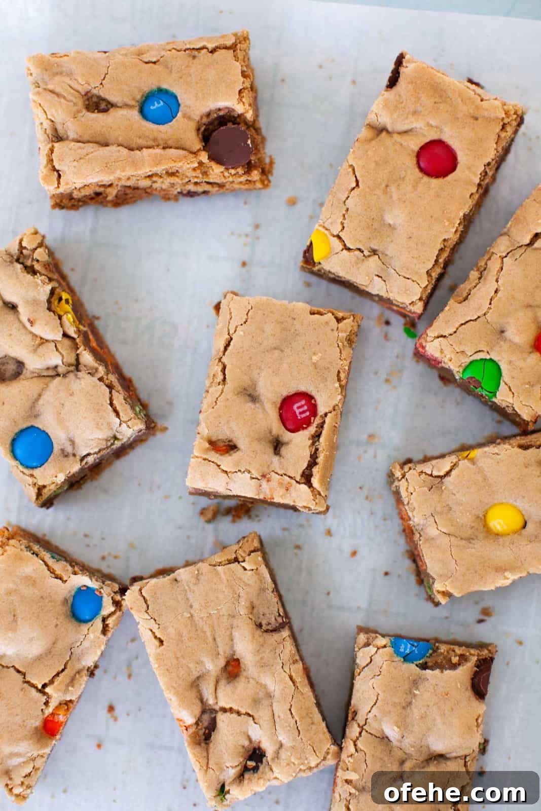 m&m cookie bars on a blue background