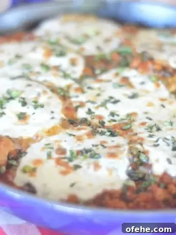Italian Polenta Skillet with chopped basil on top.
