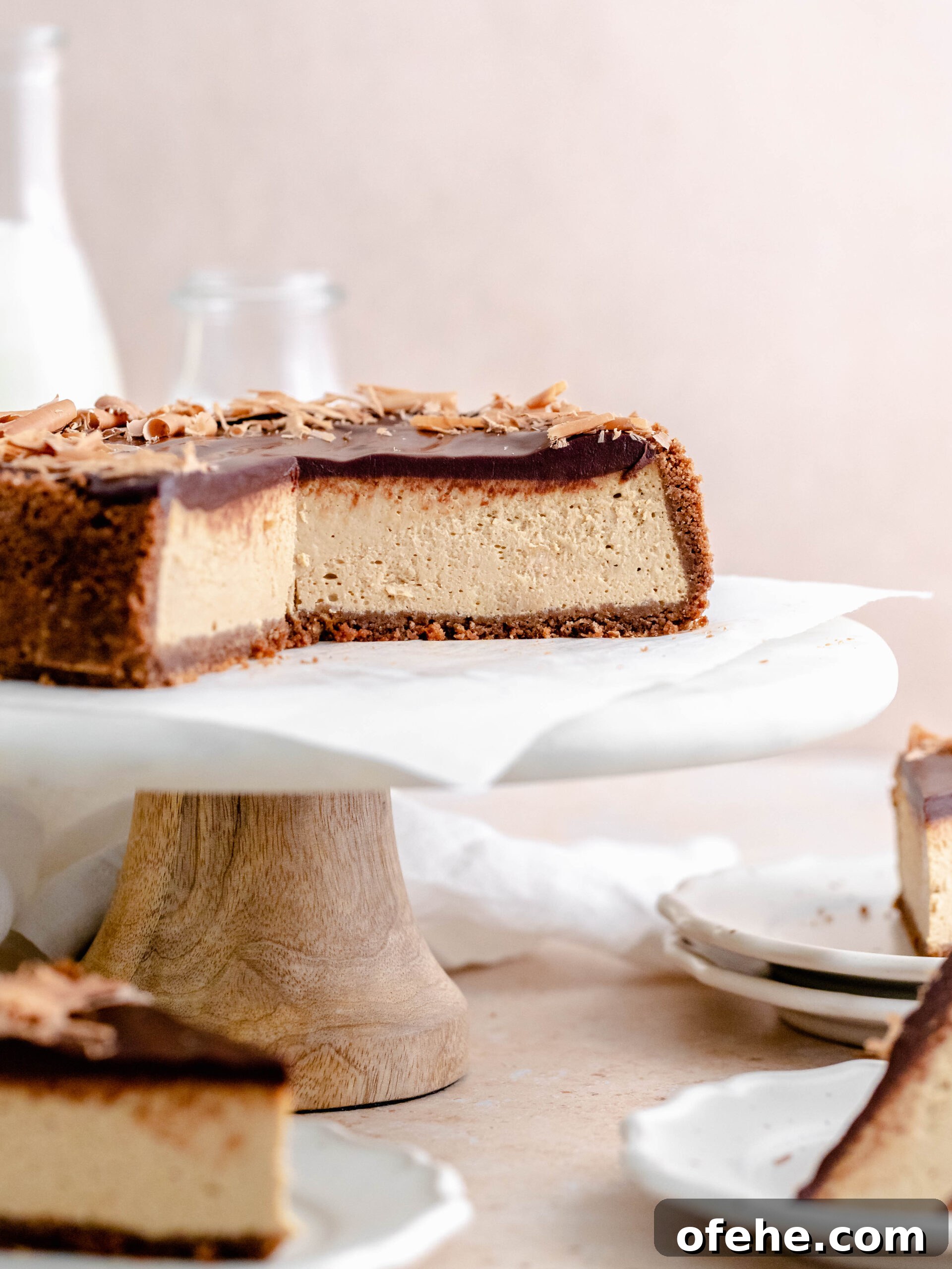 Decadent Coffee Cheesecake Recipe for Coffee Lovers 2 Espresso cheesecake with a cacao cookie crust, and topped with smooth dark chocolate ganache.