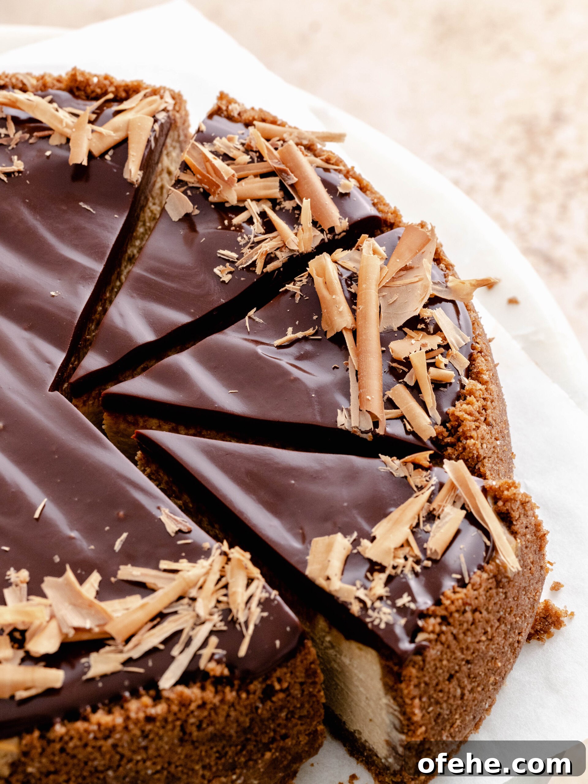Decadent Coffee Cheesecake Recipe for Coffee Lovers 3 Espresso cheesecake cut into pieces on a tray.