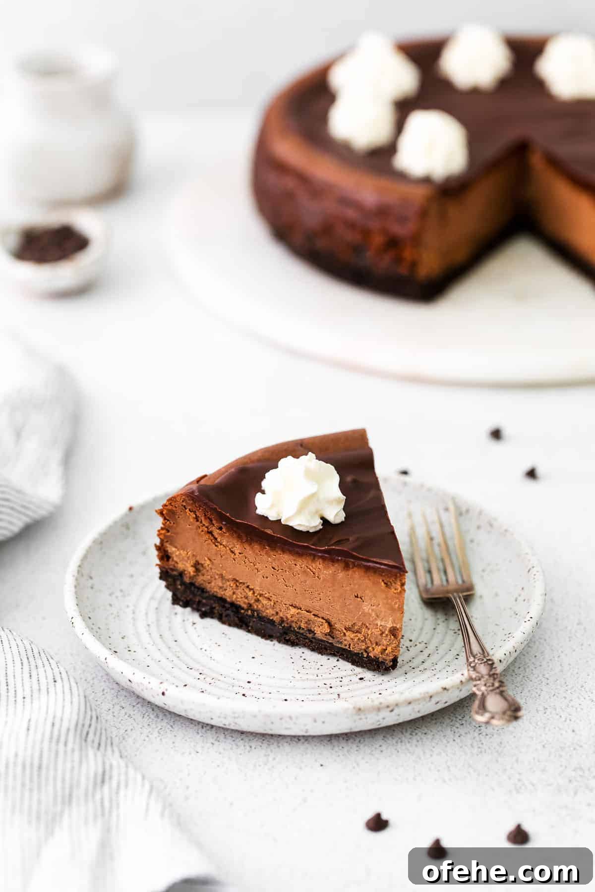 slice of chocolate cheesecake on plate