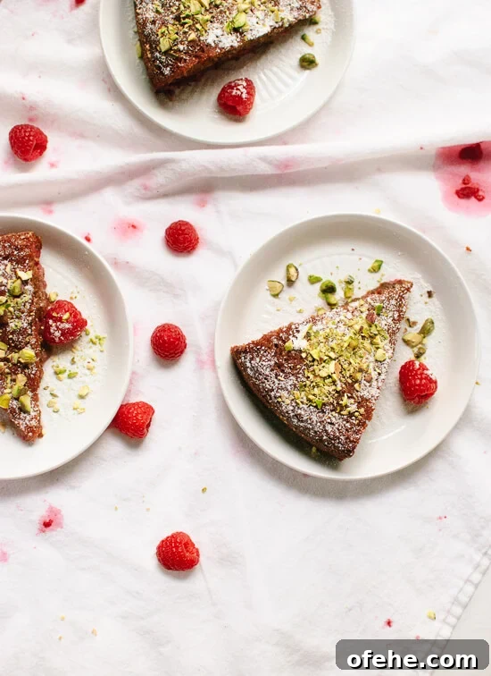 Honey Almond Cake with Raspberries, Orange & Pistachios 11 This gluten-free almond meal and honey cake is a delicious summertime treat. cookieandkate.com