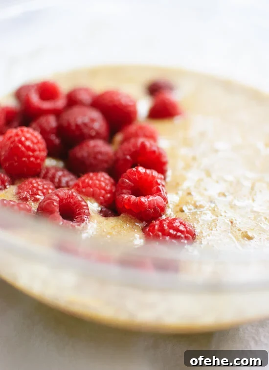 Honey Almond Cake with Raspberries, Orange & Pistachios 6 raspberry batter