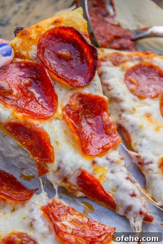 slices of homemade pizza with pepperoni.