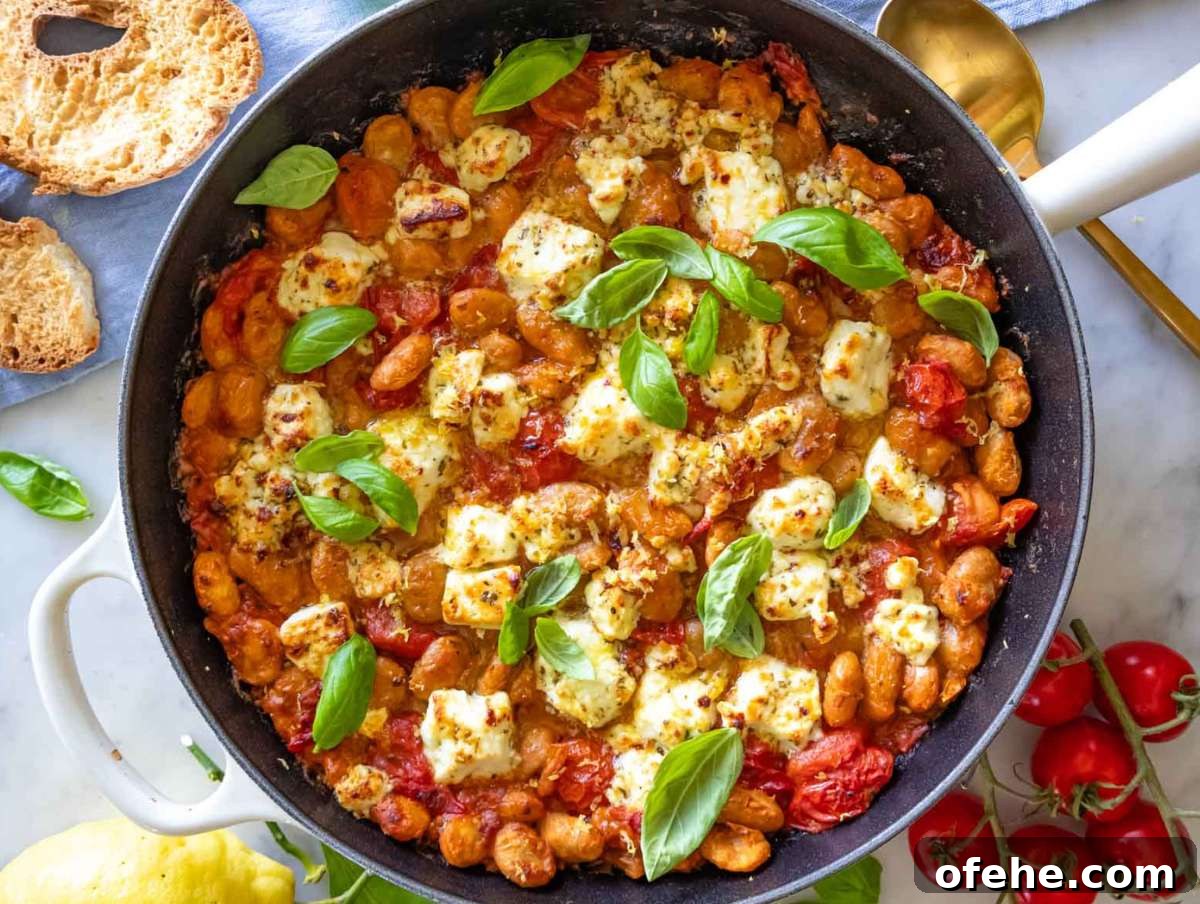 30-Minute Dinners We Cook on Busy Weeknights 13 Feta-topped butter bean stew in a skillet, after broiling, topped with basil.