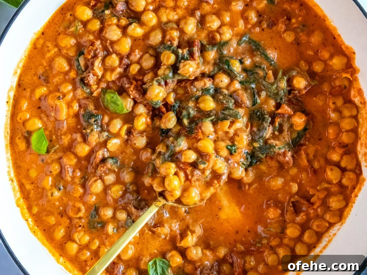 30-Minute Dinners We Cook on Busy Weeknights 14 Marry me chickpeas in a white skillet.