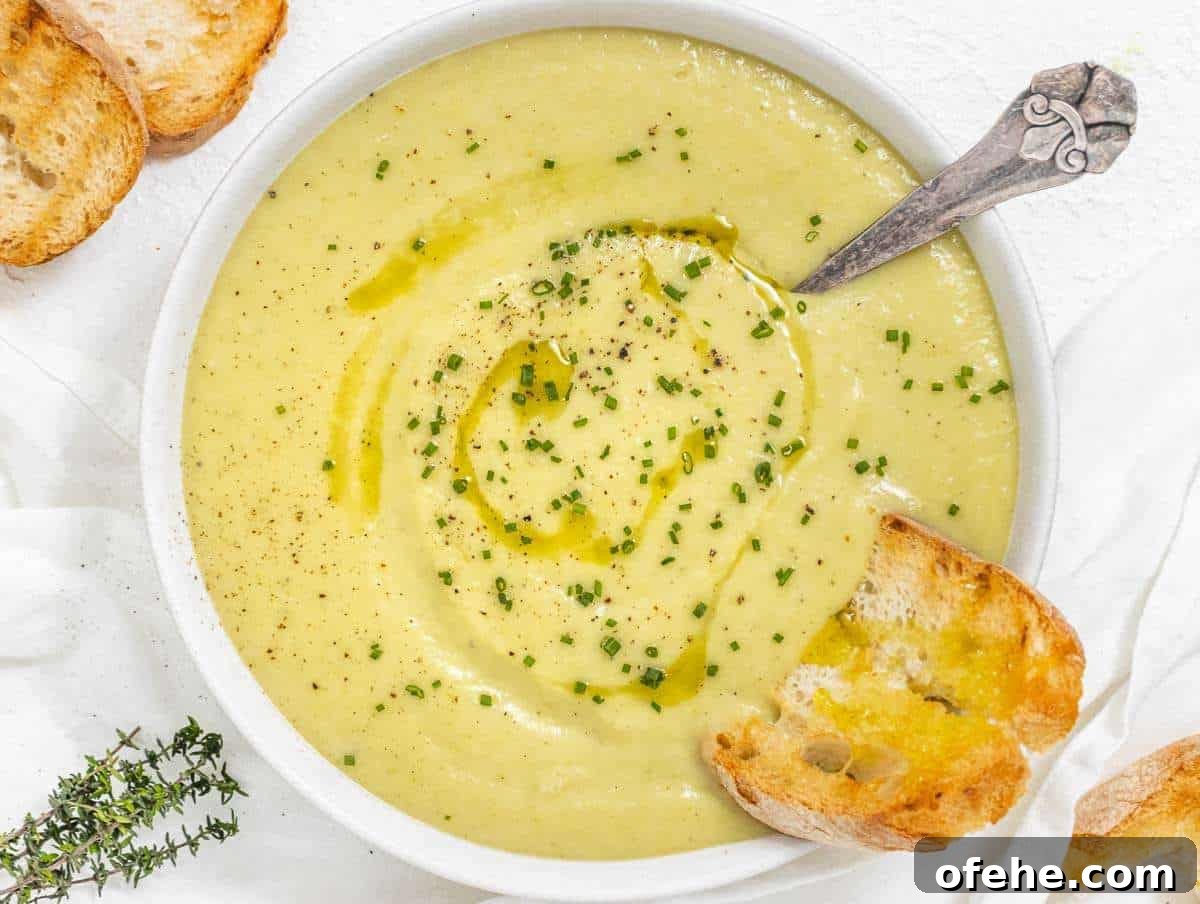 30-Minute Dinners We Cook on Busy Weeknights 20 Step 4 Bowl of potato leek soup garnished with chives and a drizzle of olive oil.