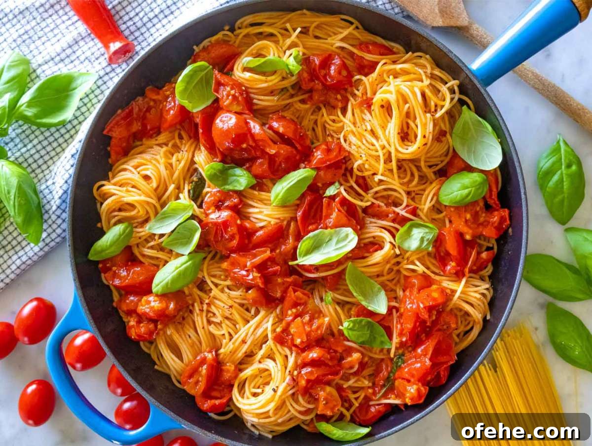 30-Minute Dinners We Cook on Busy Weeknights 22 Step 5 Grated parmesan melting into angel hair pasta with tomatoes, garnished with basil and olive oil.