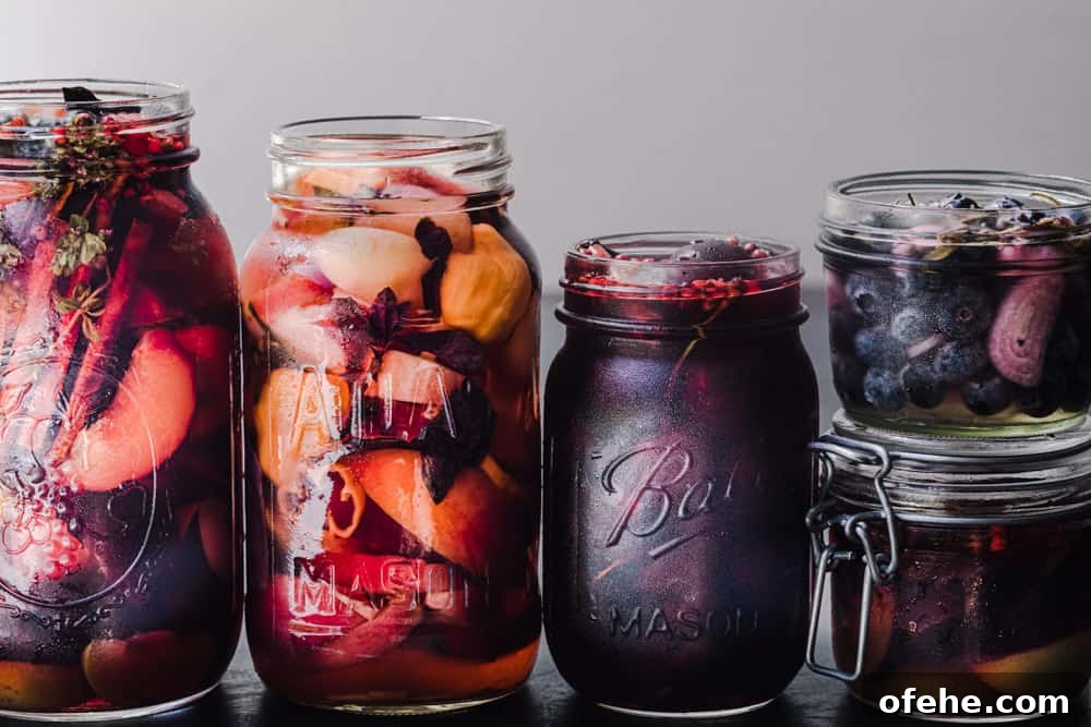 Quick Pickled Fruit: Perfect Brine Ratio for Every Batch 2 5 different jars of pickled fruits! There's pickled peaches, pickled plums, pickled cherries, pickled blueberries, and pickled fruit, shot straight on.