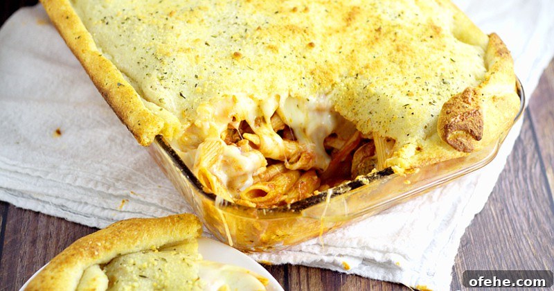 Meat Lover Pizza Pasta Bake is a yummy easy pasta bake recipe for family dinner loaded up with all your meaty favorites like sausage, ham, bacon, pepperoni, and meatballs with penne noodles in classic red sauce. So yummy!