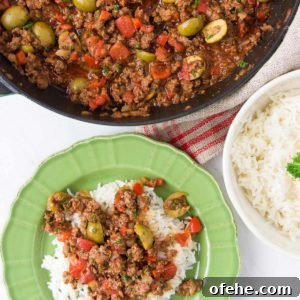 Authentic Brazilian Picadillo (Picadinho) Recipe for Dinner 14 Picadillo is served over rice in a bright green bowl next to a pan holding more picadillo and a bowl holding extra rice