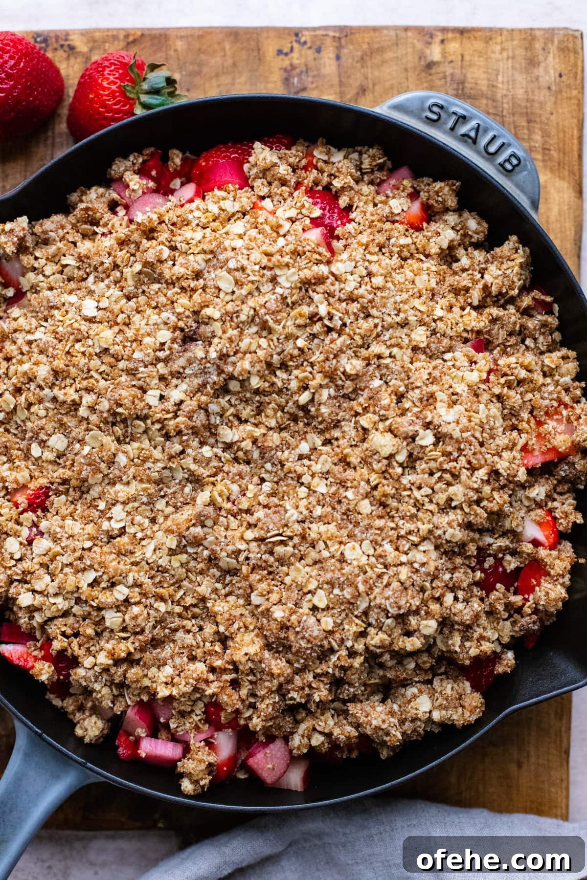 Gluten-Free Strawberry Rhubarb Crisp Recipe for Summer Dessert 7 skillet pan with gluten free strawberry rhubarb crisp in it.