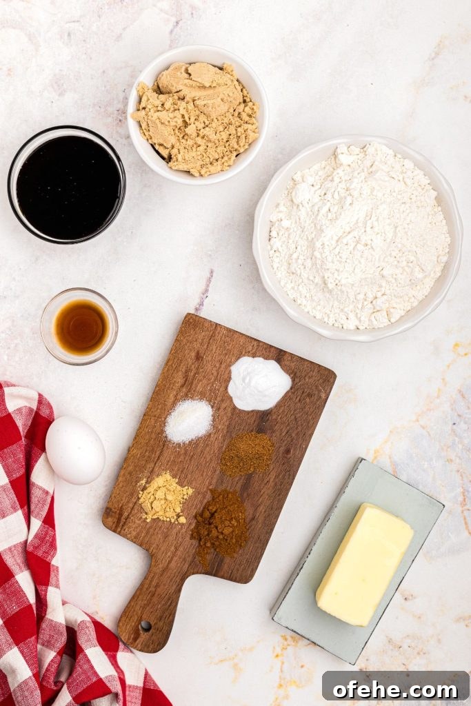 Chewy Air Fryer Gingerbread Cookies Recipe 4 Ingredients measured on the marble table with a red linen