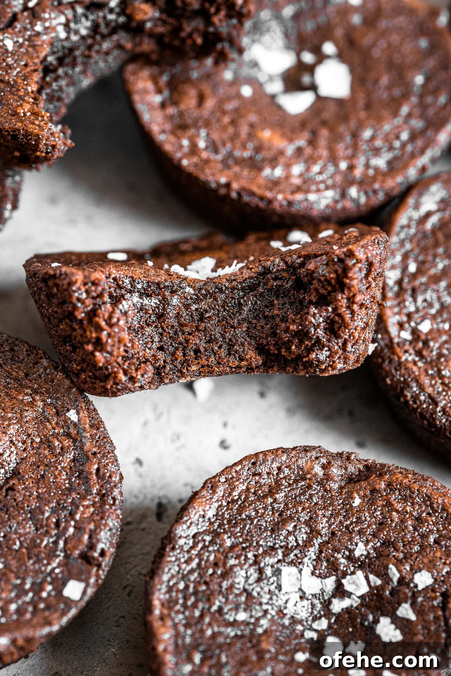 Salted Caramel Brownie Bites in a Muffin Tin 3 Close up of brownie cups with a bite missing