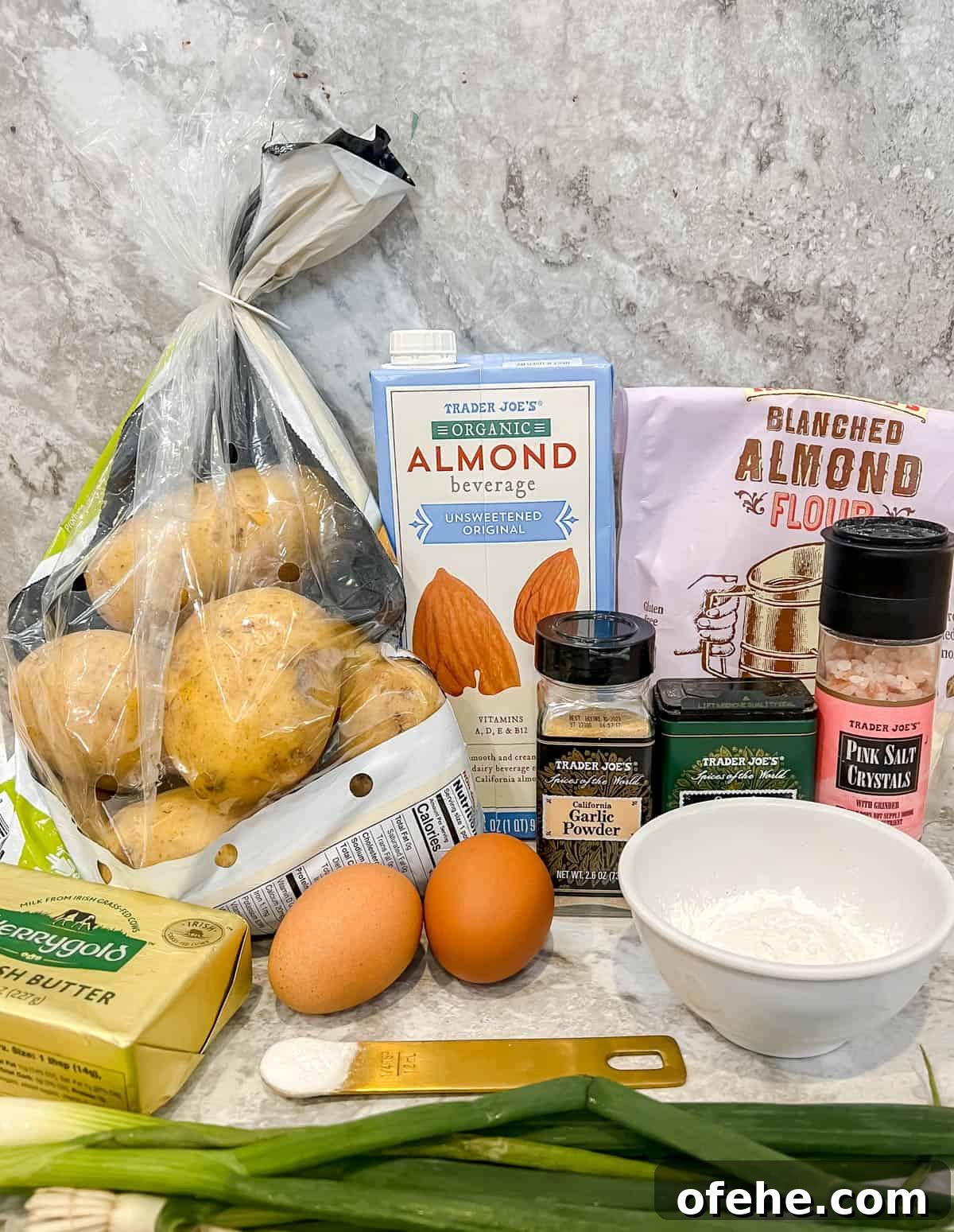 Gluten-Free Potato Pancakes with Optional Whole30 Version 3 Ingredients needed to make gluten free potato pancakes.