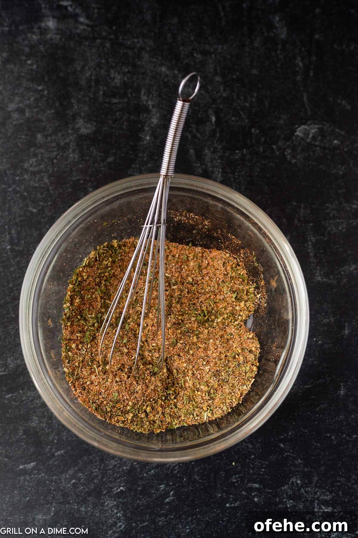 Homemade Blackened Seasoning Blend for Perfect Cajun Flavor 4 Mixing the seasoning in a bowl