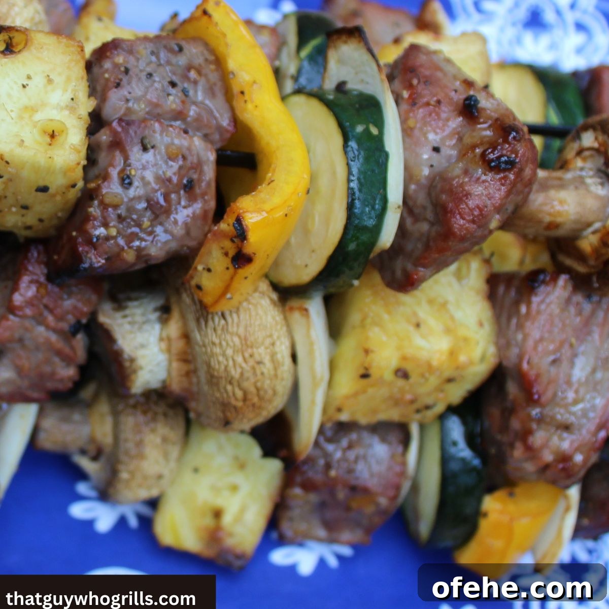 Juicy Grilled Steak Kabobs with Garlic Herb Marinade 6 Grilled steak Kabobs Served On platter