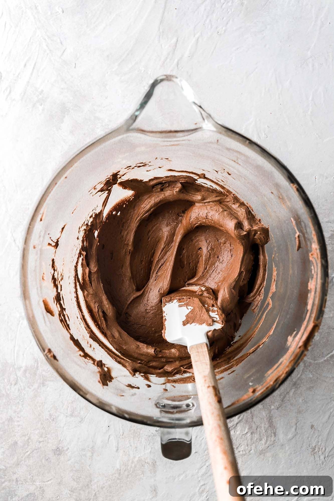 Decadent 8-Inch Chocolate Cake Recipe for Any Occasion 13 chocolate buttercream in a bowl