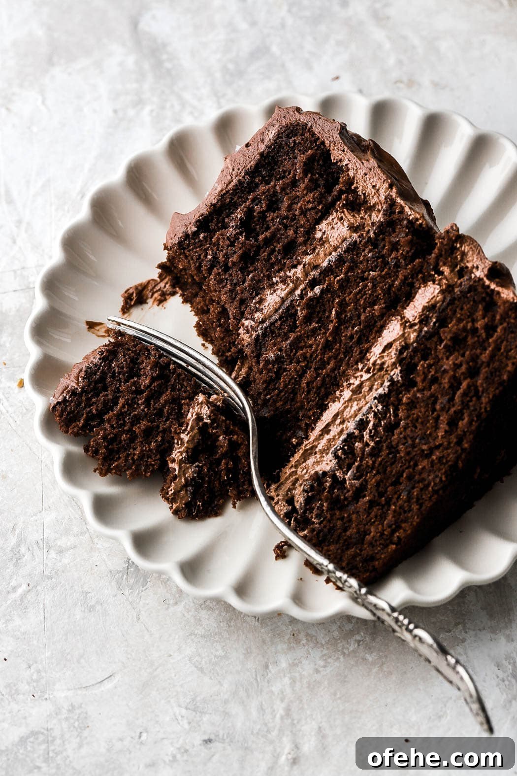 Decadent 8-Inch Chocolate Cake Recipe for Any Occasion 17 bite of chocolate cake on a plate