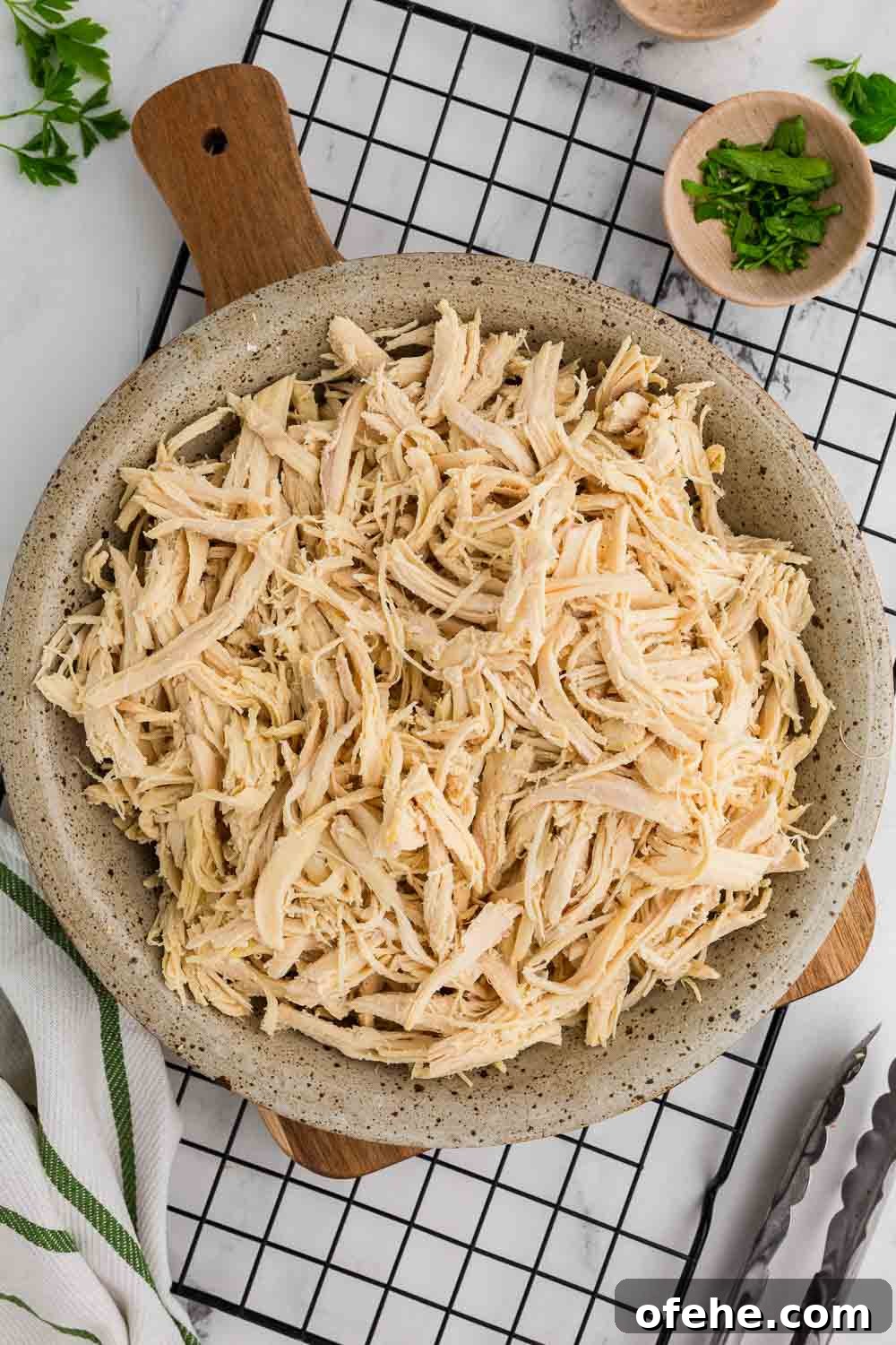 Slow Cooker Shredded Chicken Recipe for Tender, Juicy Meat 8 Slow cooker shredded chicken cooked and served in large dish