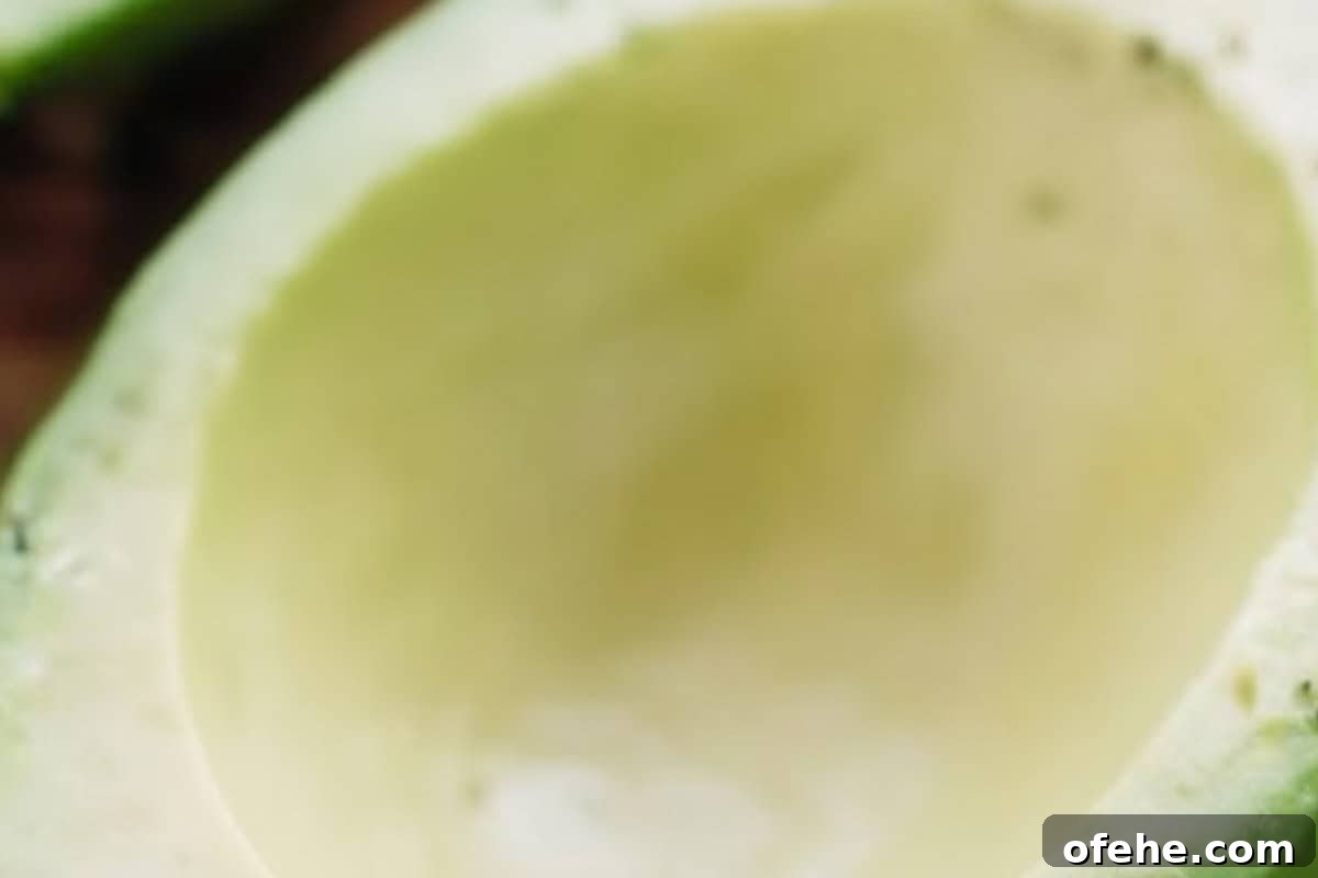 Creamy Avocado Scrambled Eggs Recipe for Quick Breakfast 5 Halve and pit the avocados, then gently remove the skins. Scoop out some of the flesh to create a small “boat,”