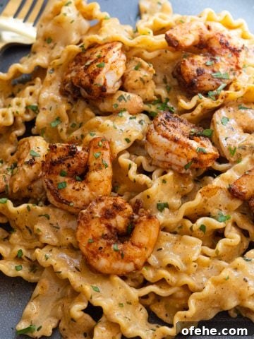 Cajun shrimp scampi topped with parsley and parmesan