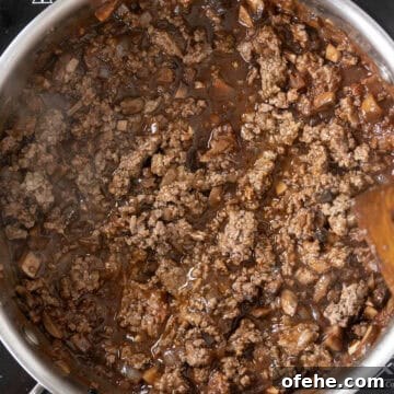 20-Minute Lamb Ragu with Pappardelle: Rustic Weeknight Pasta Recipe 10 Lamb returned to the saucepan with sauce.