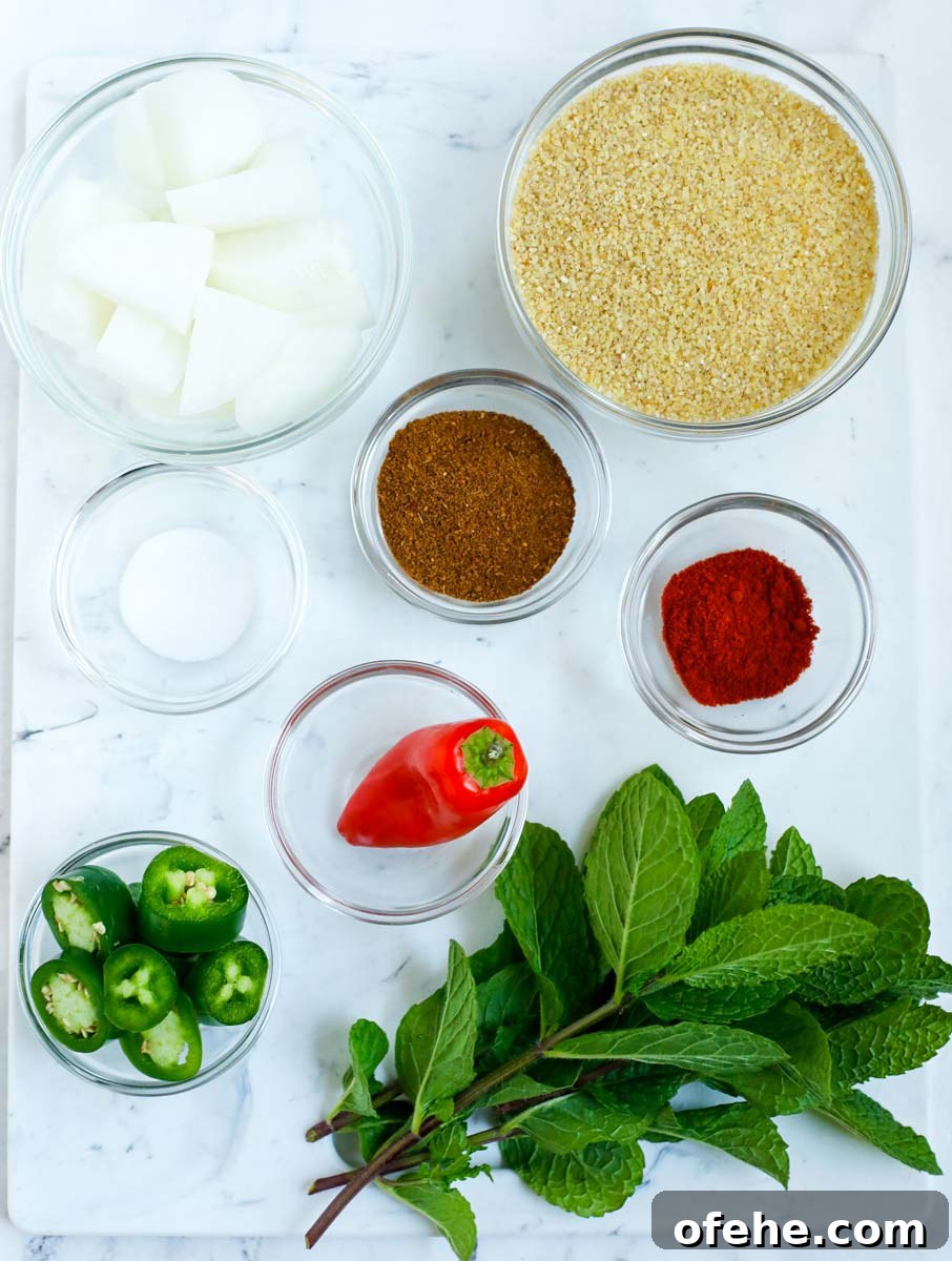 Lebanese Kibbeh Bil Sanieh: Baked Kibbeh Recipe from Lebanon 6 kamouneh ingredients laid out