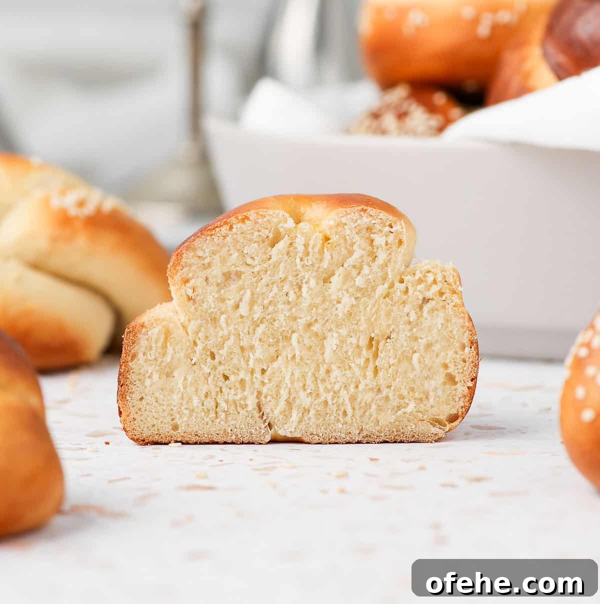 Soft and Fluffy Challah Dinner Rolls: Perfect for Any Meal 10 Challah sliced in half (crumb shot).