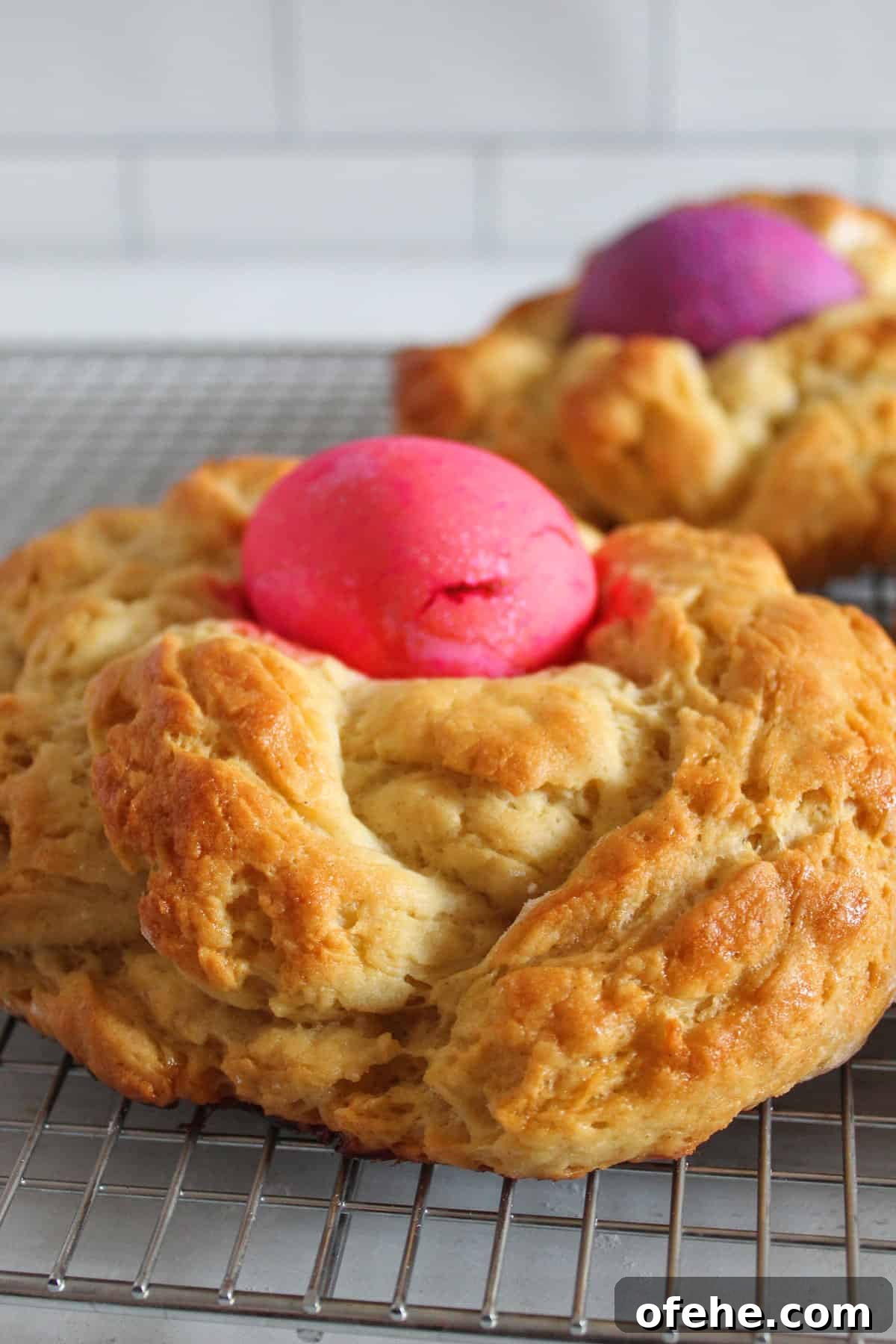 Traditional Gluten-Free Easter Bread Recipe for Spring Celebrations 2 braided loaf of gluten free easter bread on a wire rack.