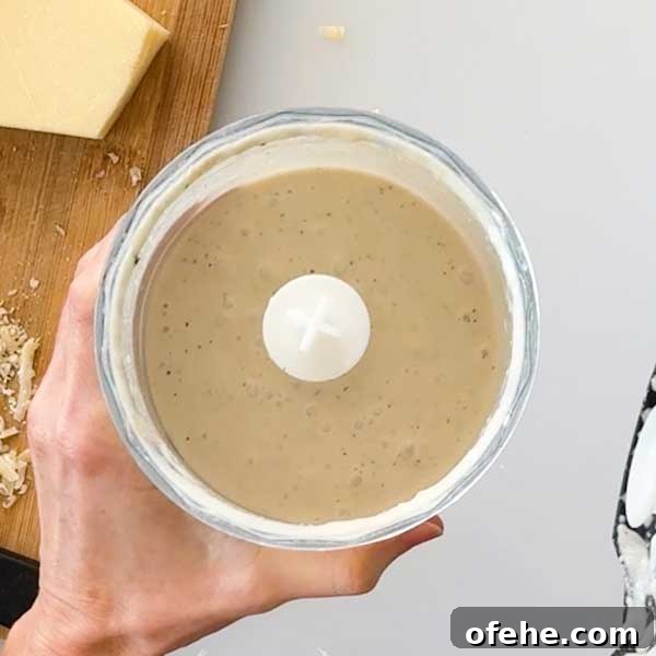 Lemon Chicken Caesar Salad with Cottage Cheese Twist 6 Blended salad dressing in a chopper cup.