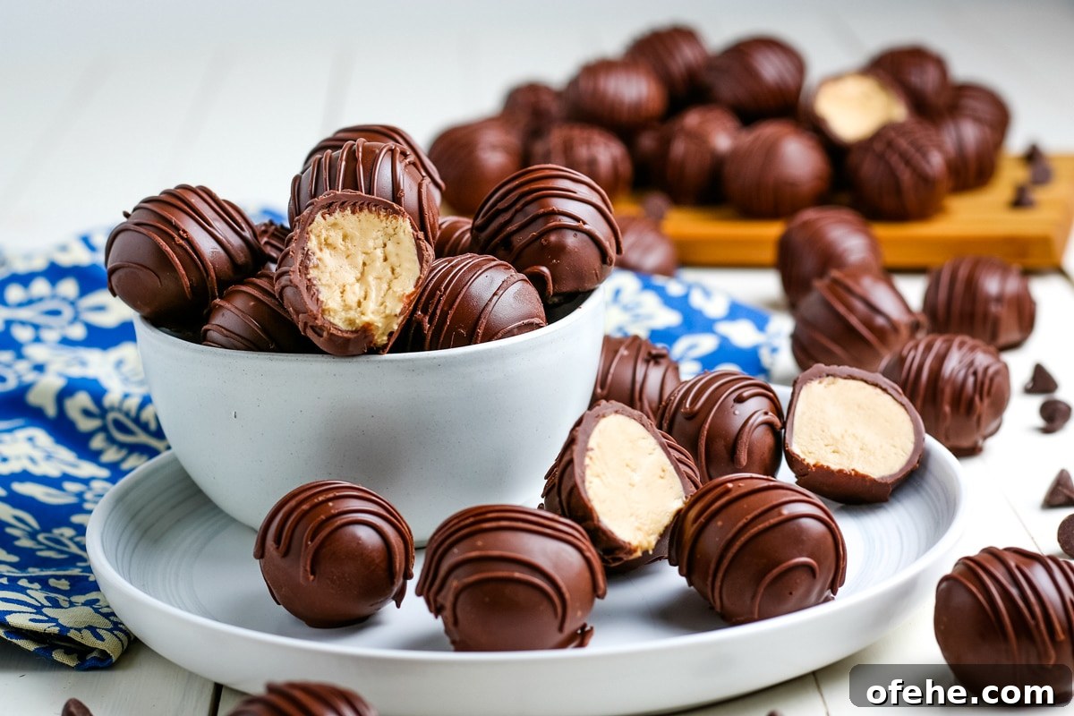Classic Old-Fashioned Peanut Butter Balls Recipe 10 finished old fashioned chocolate covered peanut butter balls in a white glass bowl and plate.