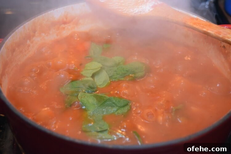Hearty Chicken Minestrone Soup Recipe for Cozy Weeknight Meals 9 Stir in spinach at the end