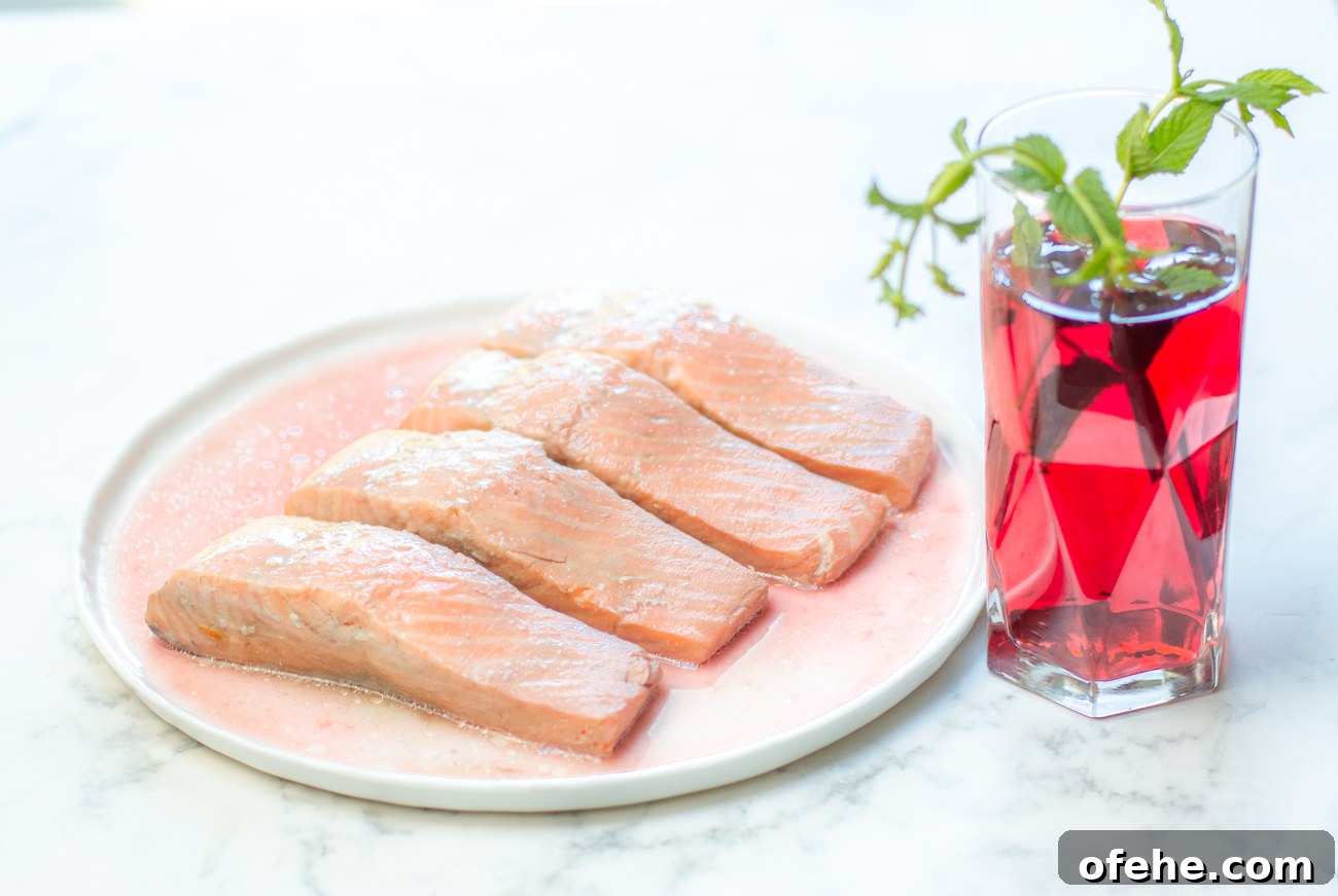 Hibiscus-Poached Salmon with Cool Tzatziki Sauce 5 Salmon after poaching in the Hibiscus Tea Court Bouillon