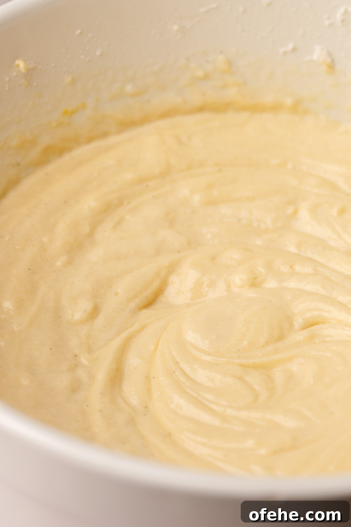Raspberry Coconut Cake Recipe with Creamy Coconut Frosting 7 Finished coconut cake batter in a bowl.