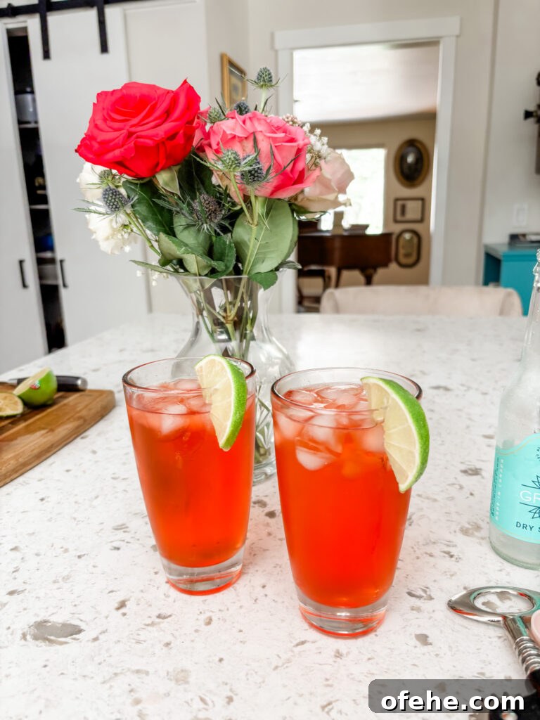 Italian Spritz Mocktail: Refreshing Non-Alcoholic Summer Cocktail 3 Two of the finished Italian Spritz mocktail garnished with a lime slice