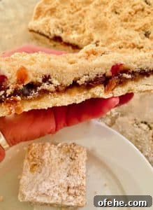 Baked Shortbread Mincemeat Slices with cherries