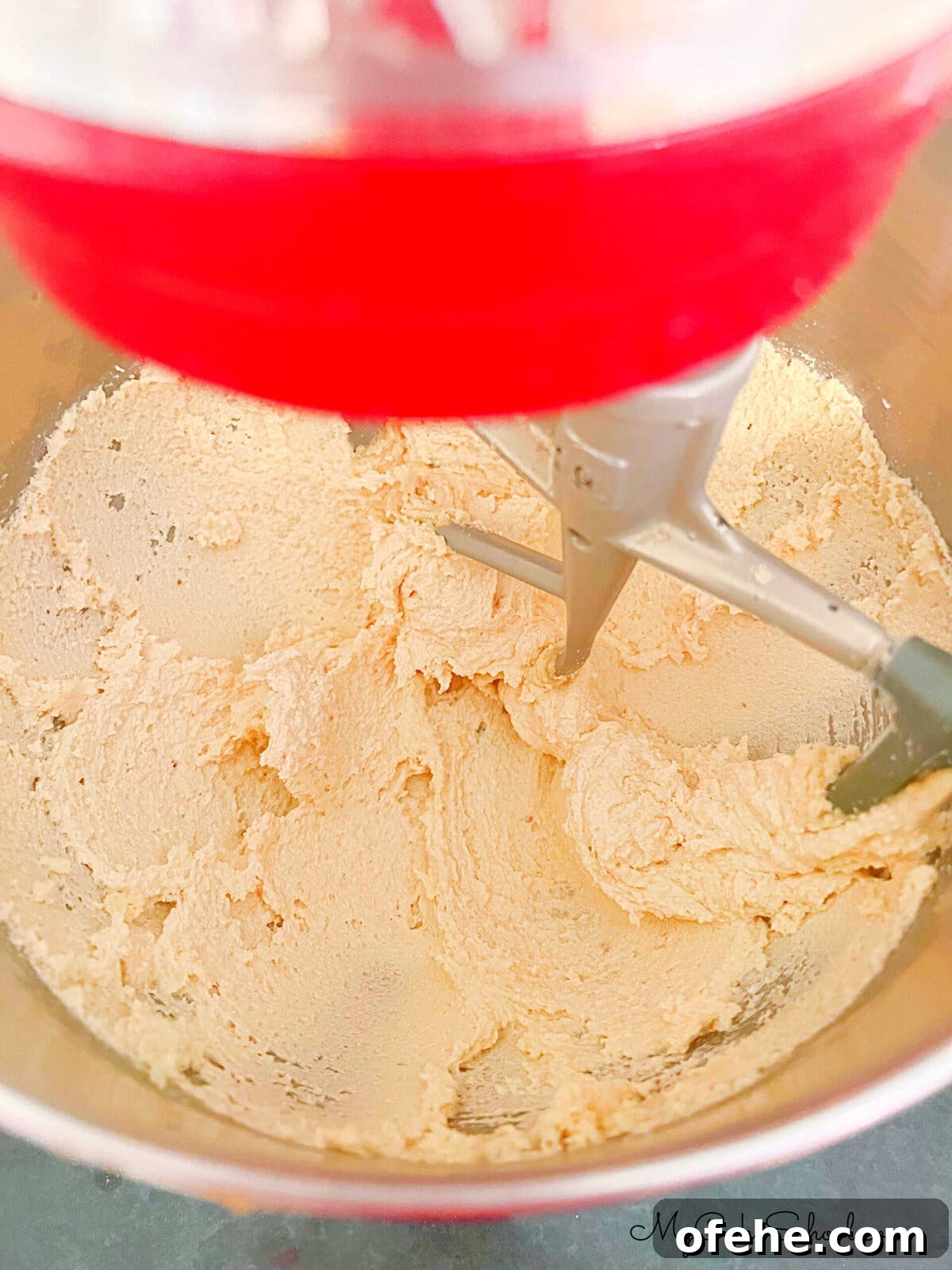 Moist Sweet Potato Cupcakes with Cinnamon Glaze 5 Mixture of sugar and butter in mixing bowl.