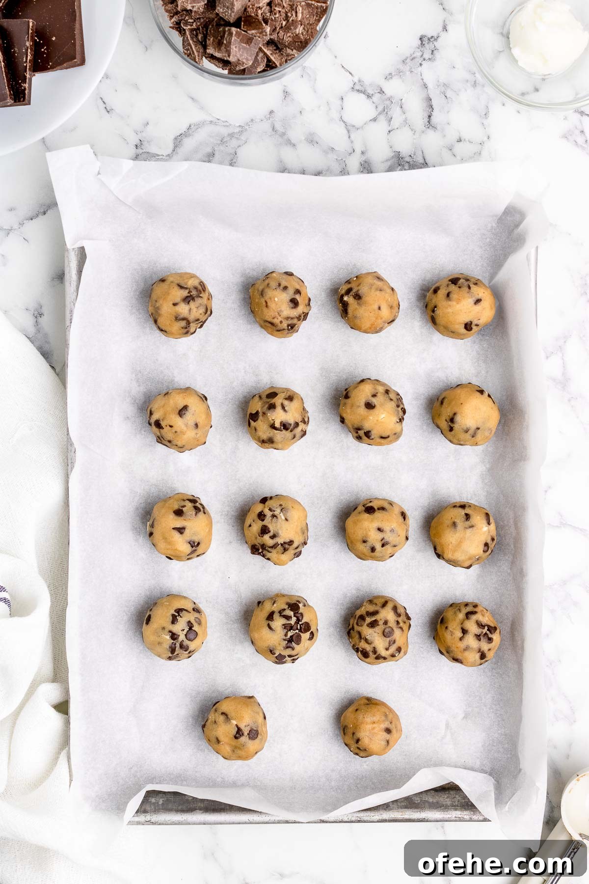 cookie dough balls on a pan