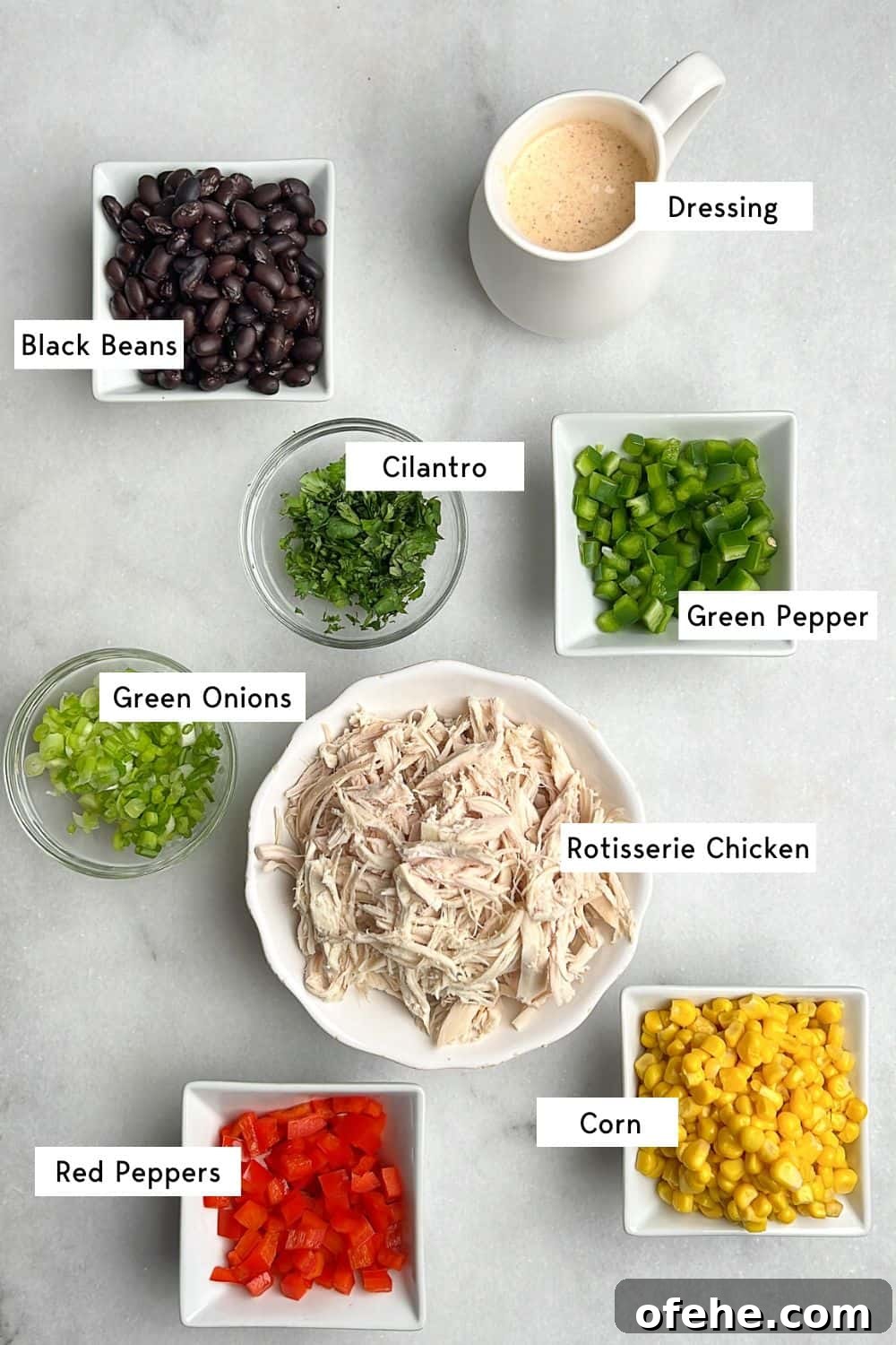 Measured ingredients for Southwest chicken salad. Ingredients measured out for southwest chicken salad