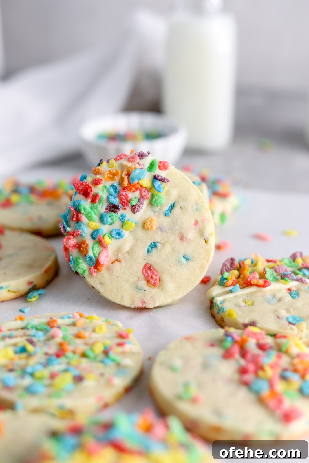 Fruity Pebbles Cookies Recipe: Colorful, Crispy Treats 10 Cookies dipped in white chocolate and topped with Fruity Pebbles cookies.